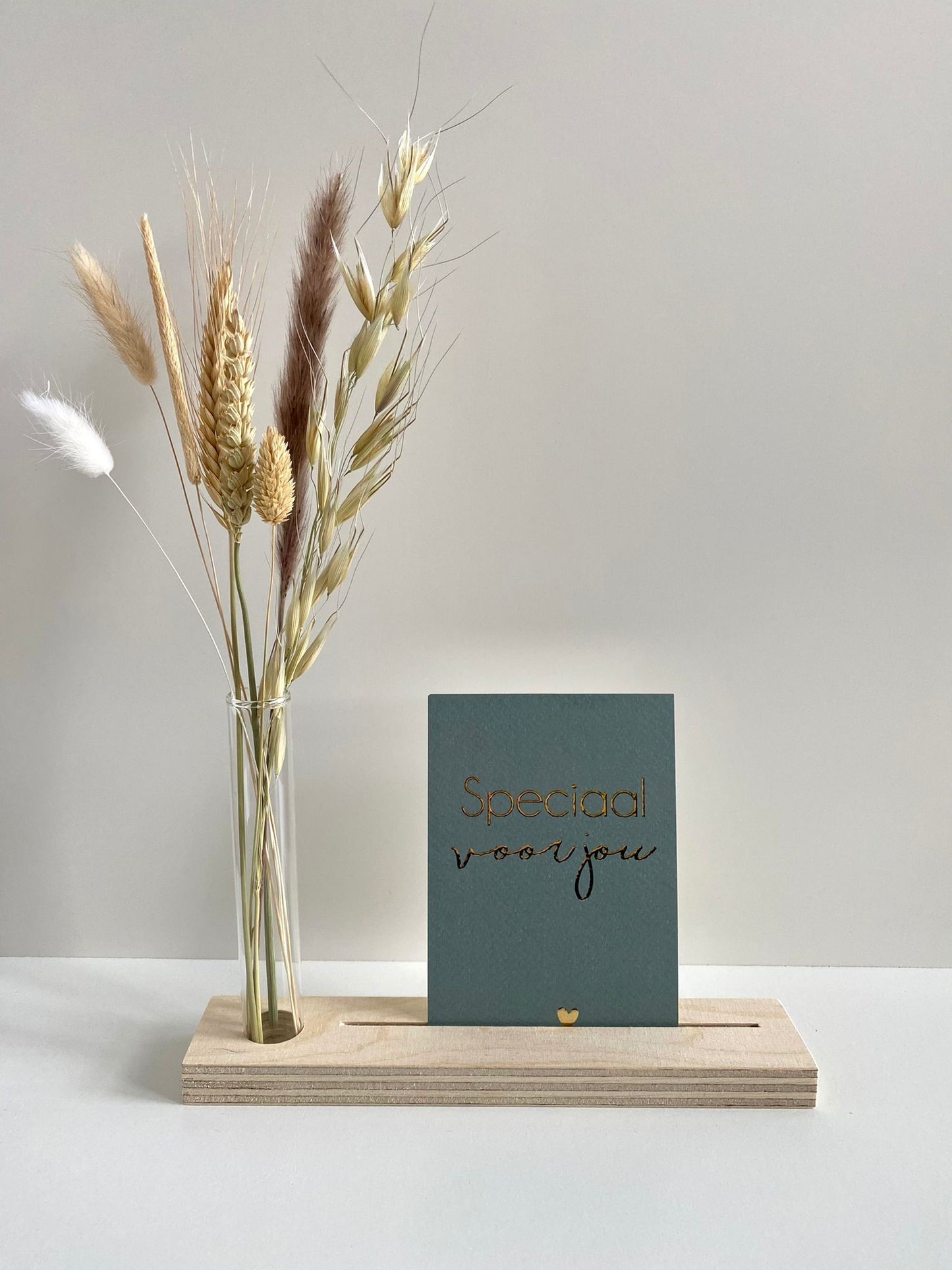 Soothing dried flowers with greeting card